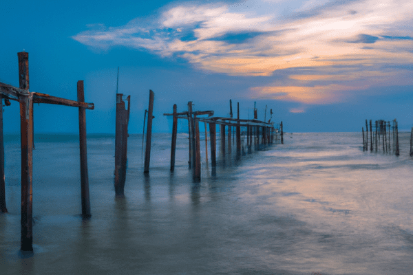 sunset beach fishing pier